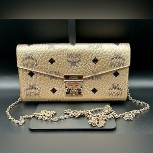 MCM  Metallic Visetos Patricia Crossbody Wallet in Gold.